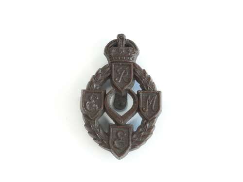 REME Plastic Cap Badge